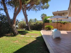 Vonkajšia záhrada v ubytovaní Playa Vacation House