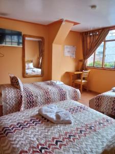 Postel nebo postele na pokoji v ubytování Hotel Santafe Inn