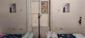 Postel nebo postele na pokoji v ubytování New Safari Hostel
