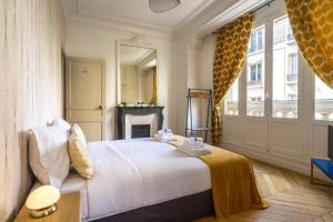 Lova arba lovos apgyvendinimo įstaigoje Charming apartment near Trocadero