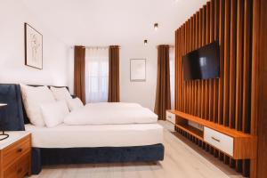 Ένα ή περισσότερα κρεβάτια σε δωμάτιο στο Loft Suite im modernen Style in Schärding