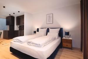 Ένα ή περισσότερα κρεβάτια σε δωμάτιο στο Loft Suite im modernen Style in Schärding