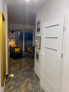 Kuchyňa alebo kuchynka v ubytovaní Apartament ZŁOTE TARASY