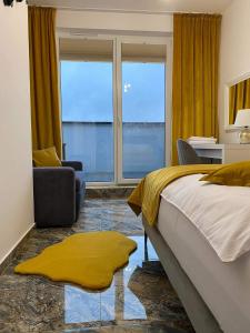 Posteľ alebo postele v izbe v ubytovaní Apartament ZŁOTE TARASY