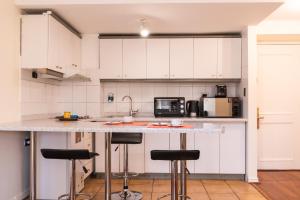 Cucina o angolo cottura di MR Apart Providencia (ex Apart Neruda)