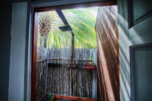 Balkón nebo terasa v ubytování Conch Beach Cabins