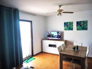 TV a/nebo společenská místnost v ubytování Peniscola Residencial Fase VI