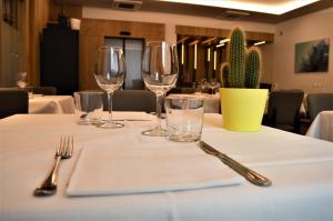 Reštaurácia alebo iné gastronomické zariadenie v ubytovaní Albergo Ristorante Da Neni