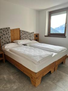 Postel nebo postele na pokoji v ubytování Al Marchior + 22 fotografií