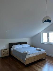 Postel nebo postele na pokoji v ubytování Boutique Hotel Tomić