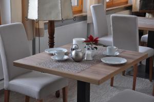 Posezení v ubytování Cafe Pension Erbhof