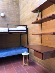 Palanda nebo palandy na pokoji v ubytování Casa Del Viento, Alojamiento