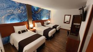 Letto o letti in una camera di Hotel Ferré Machu Picchu