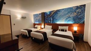 Letto o letti in una camera di Hotel Ferré Machu Picchu