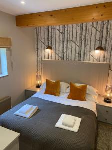 Postel nebo postele na pokoji v ubytování Yorkshire Dales Lodge 18 by Together Travel - 3-Bed Premium Family