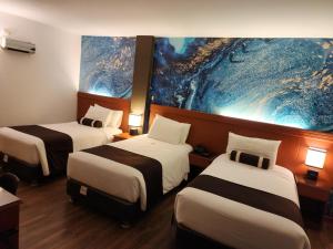 Letto o letti in una camera di Hotel Ferré Machu Picchu