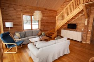 Khu vực ghế ngồi tại Blockhaus am See - Komfort umgeben von Natur!