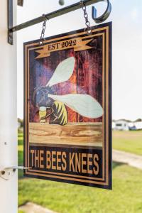 a sign that reads the bees knees at The Bee's Knees in Mundesley