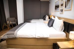Postel nebo postele na pokoji v ubytování Triss Hotel