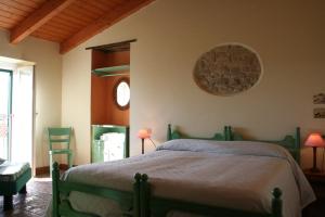 Кровать или кровати в номере Agriturismo Villa Fiore