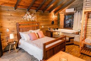 Postel nebo postele na pokoji v ubytování Vertente dos Canyons