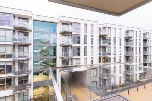 an image of an apartment building with balconies at The Hunt Cherrywood in Loughlinstown