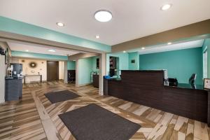 a lobby with mats on the floor of a hospital at SureStay Plus Hotel by Best Western Elizabeth City in Elizabeth City