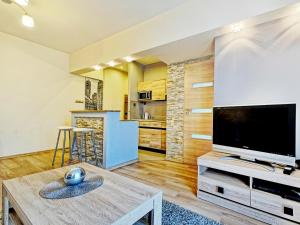 Kuchyňa alebo kuchynka v ubytovaní Apartament Kameralny III na Starówce