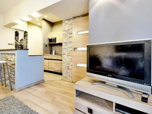 Kuchyňa alebo kuchynka v ubytovaní Apartament Kameralny III na Starówce