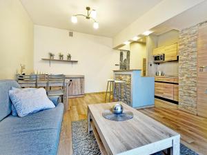 Kuchyňa alebo kuchynka v ubytovaní Apartament Kameralny III na Starówce + 16 fotografií