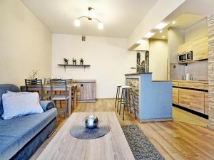 Kuchyňa alebo kuchynka v ubytovaní Apartament Kameralny III na Starówce