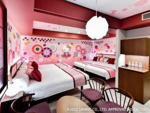 Postel nebo postele na pokoji v ubytování Asakusa Tobu Hotel