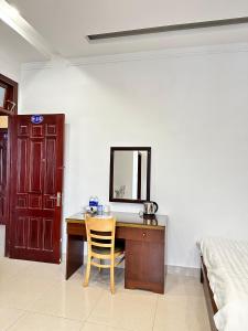 Rúm í herbergi á Hoàng Anh hotel