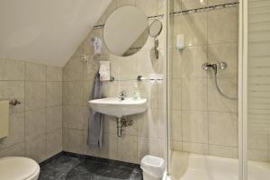 Koupelna v ubytování Hotel Haus Kleimann-Reuer