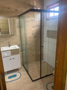 Ванна кімната в Casa charme da lagoa