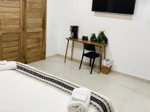 Μια τηλεόραση ή/και κέντρο ψυχαγωγίας στο Cabañas Madre Tierra +17 φωτογραφίες