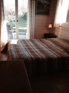Llit o llits en una habitació de BnB Atelier de St. Maurice