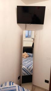 A bed or beds in a room at il Biscottino