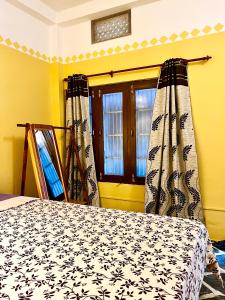 Postel nebo postele na pokoji v ubytování Paris Guest House