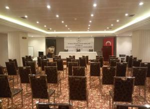 a room with a bunch of chairs in it at Dafne Hotel in Ankara