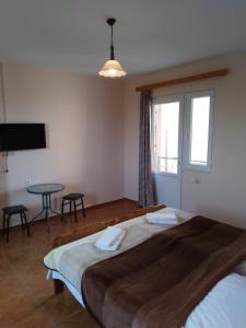 Letto o letti in una camera di Nika Inn Kobuleti