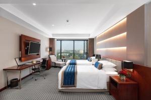 Katil atau katil-katil dalam bilik di Yangon Thanlwin Hotel