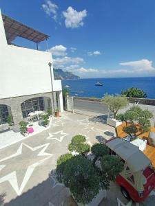 a building with a view of the ocean at Villa Bossa in Amalfi