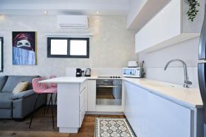 Virtuvė arba virtuvėlė apgyvendinimo įstaigoje Sahara Vibes by HolyGuest