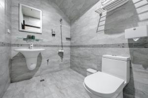 Een badkamer bij Knock Knock Style Inn