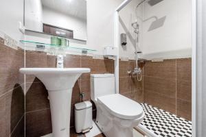 Een badkamer bij Knock Knock Style Inn