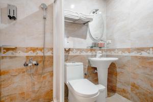 Een badkamer bij Knock Knock Style Inn