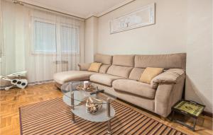 A seating area at Stunning Apartment In Gijón With Wifi