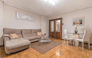 A seating area at Stunning Apartment In Gijón With Wifi