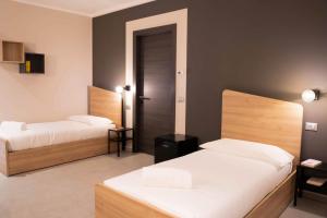 A bed or beds in a room at Terranova49